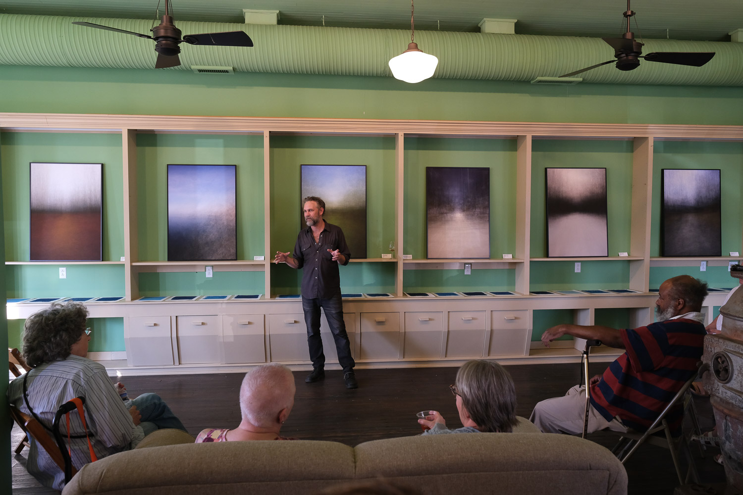 John Ryan Brubaker speaking at the opening of his exhibition at Aurora Project, July 12, 2026.